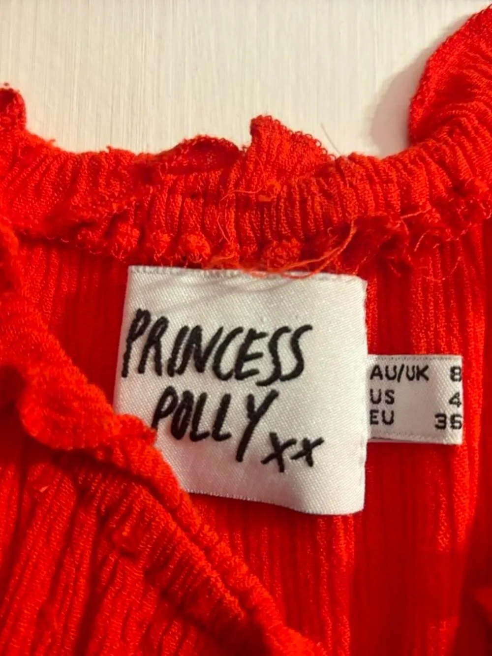 Red Ruffled Romper Mini Dress - Picture 2 of 3